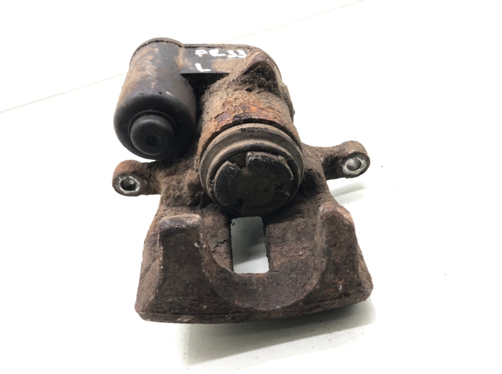 Суппорт задний левый бу для Volkswagen Tiguan  2.0 TDi,  2009 г.