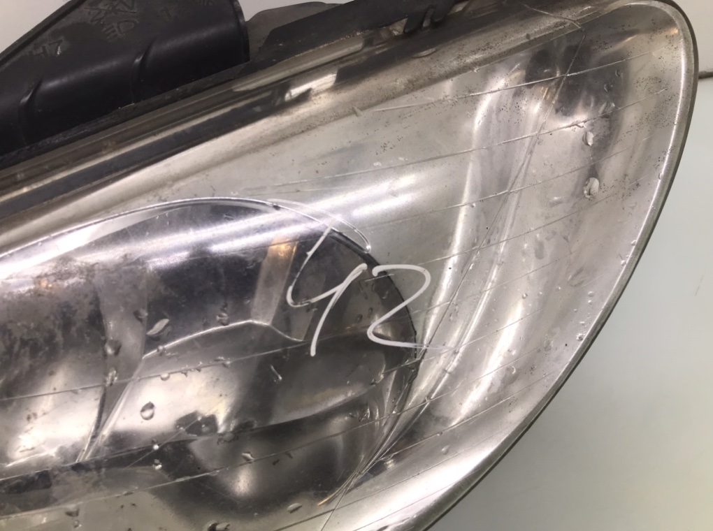 Фара левая бу для Peugeot 206  1.4 i,  2004 г.