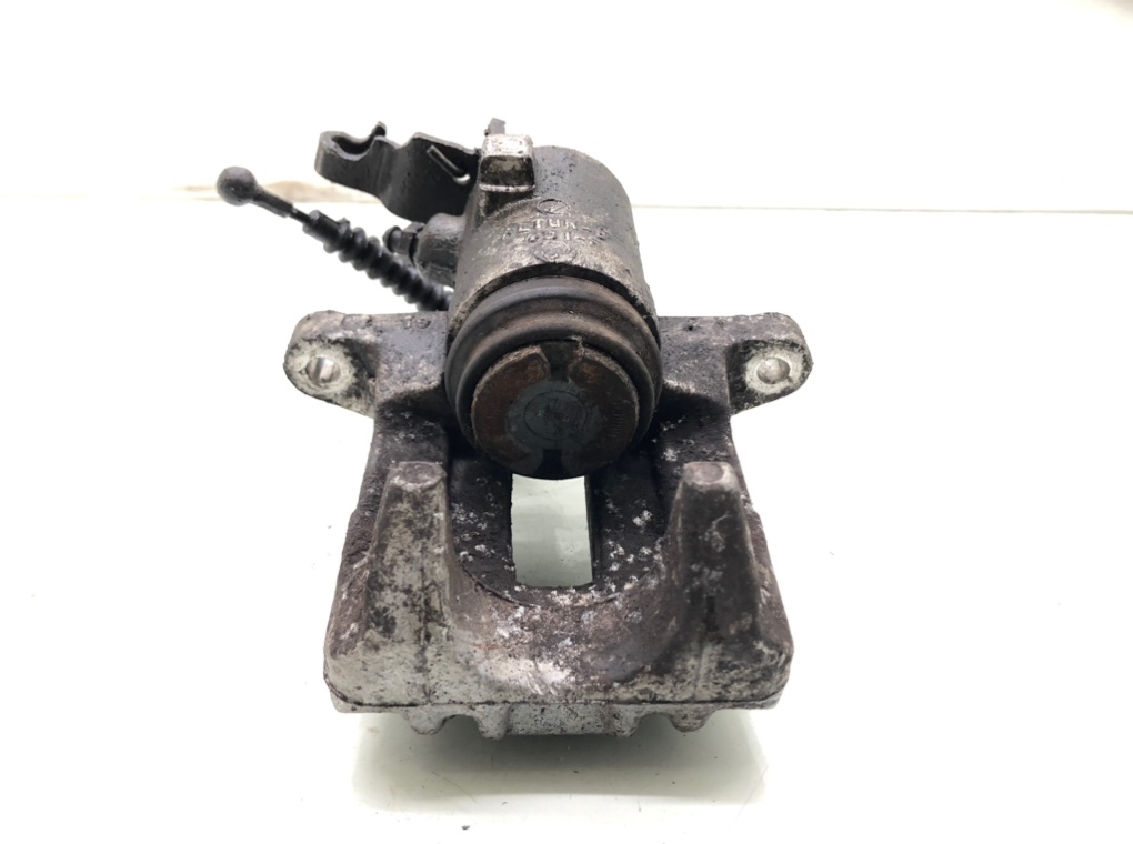 Суппорт задний левый бу для Seat Leon  2.0 TDi,  2007 г.