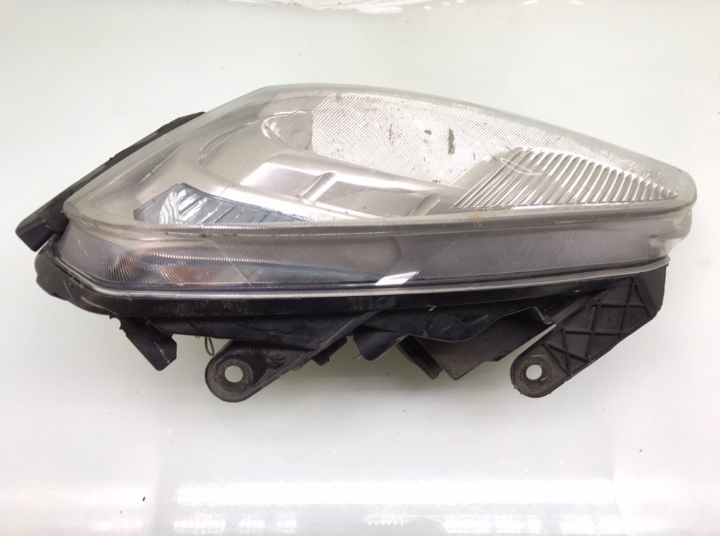 Фара левая бу для Nissan Qashqai  1.5 DCi,  2009 г.