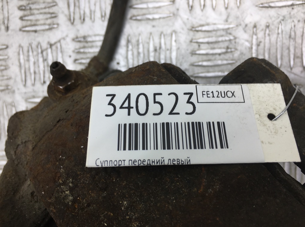 Суппорт передний левый бу для Volkswagen Passat B7 2.0 TDi,  2012 г.