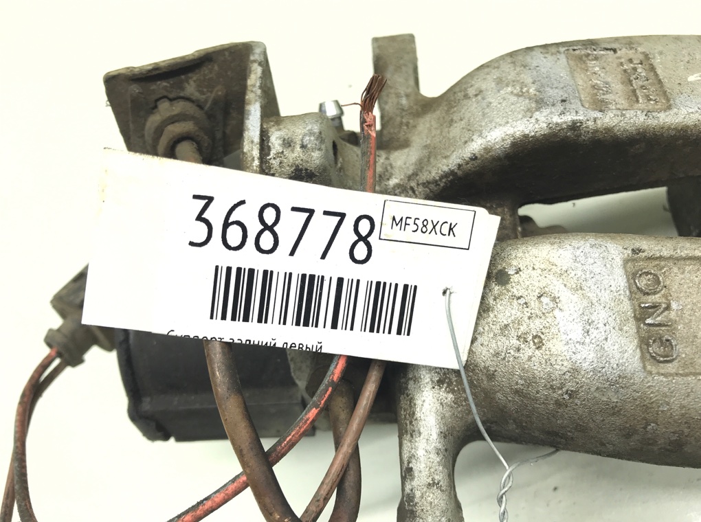 Суппорт задний левый бу для Volkswagen Passat B6 2.0 TDi,  2008 г.