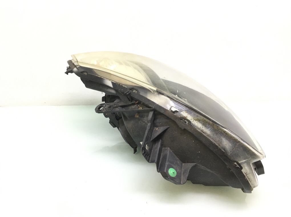 Фара левая бу для Renault Clio  1.5 DCi,  2009 г.