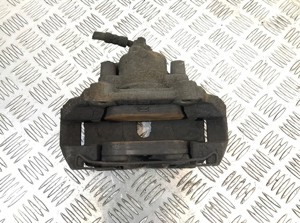 Суппорт передний левый бу для Skoda Rapid 1.2 TSI, 2014 г.