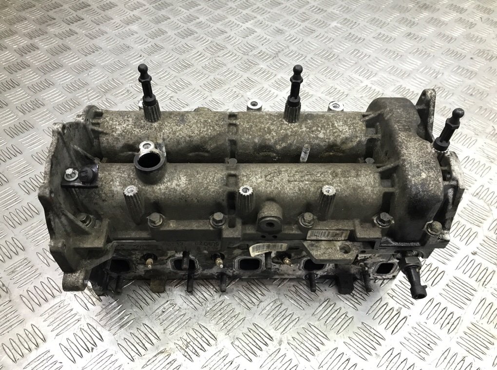 Головка блока цилиндров бу для Opel Corsa D 1.3 CDTi, 2010 г.