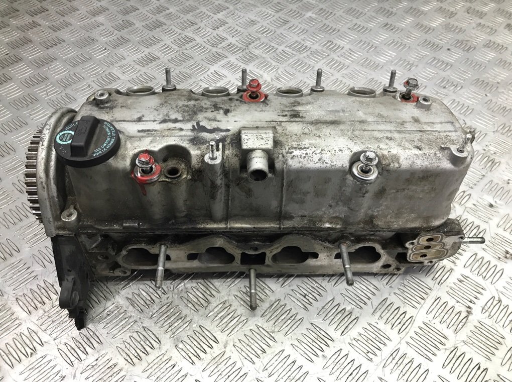 Головка блока цилиндров бу для Honda Civic 7 1.6 i, 2005 г.