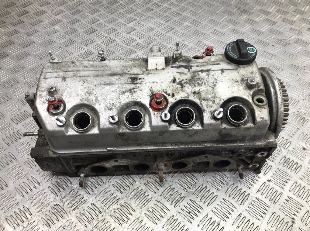 Головка блока цилиндров бу для Honda Civic 7 1.6 i, 2005 г. Головка блока цилиндров бу для Honda Civic 7 1.6 i, 2005 г.