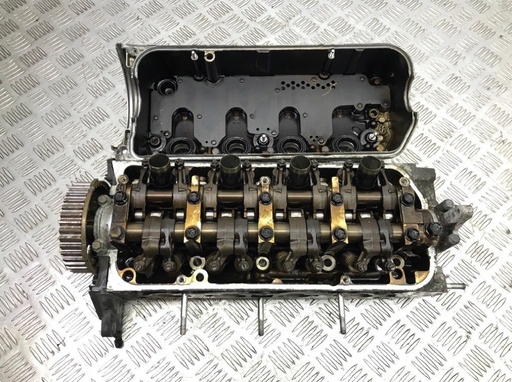 Головка блока цилиндров бу для Honda Civic 7 1.6 i, 2005 г. Головка блока цилиндров бу для Honda Civic 7 1.6 i, 2005 г.