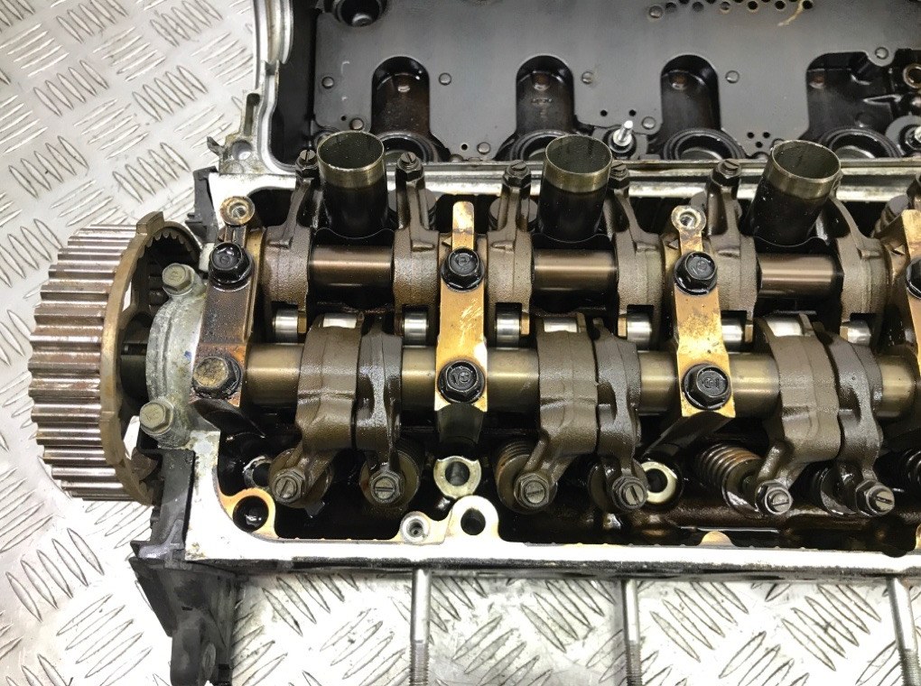 Головка блока цилиндров бу для Honda Civic 7 1.6 i, 2005 г. Головка блока цилиндров бу для Honda Civic 7 1.6 i, 2005 г.