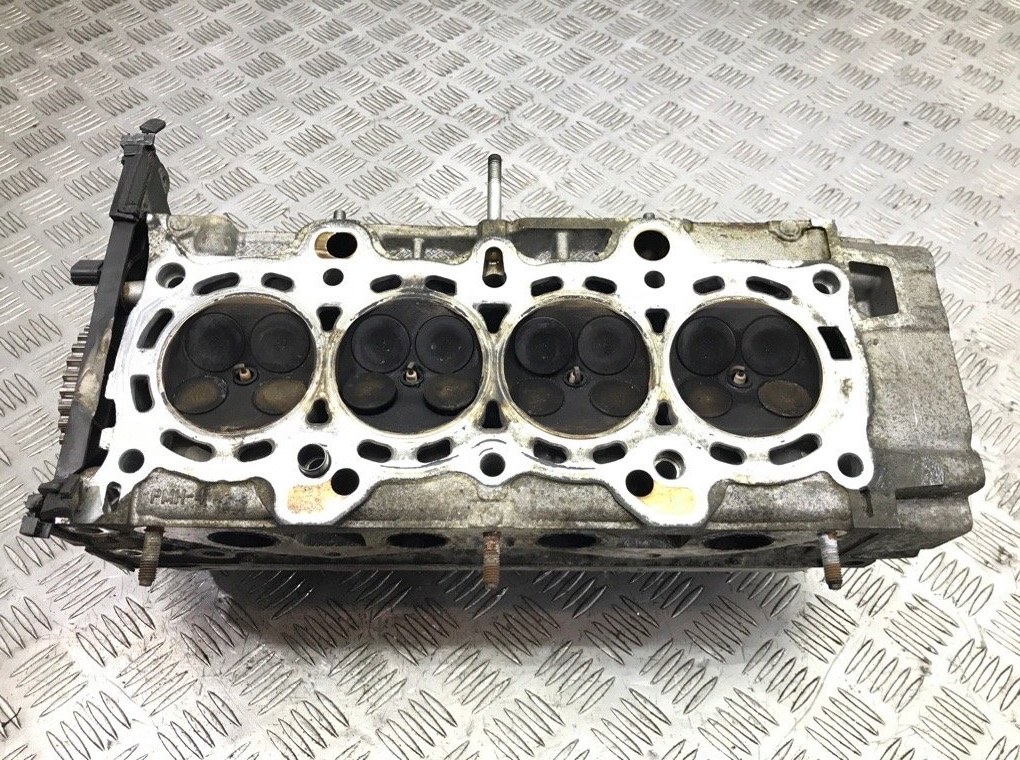 Головка блока цилиндров бу для Honda Civic 7 1.6 i, 2005 г. Головка блока цилиндров бу для Honda Civic 7 1.6 i, 2005 г.