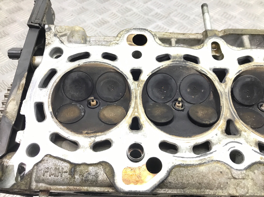 Головка блока цилиндров бу для Honda Civic 7 1.6 i, 2005 г. Головка блока цилиндров бу для Honda Civic 7 1.6 i, 2005 г.