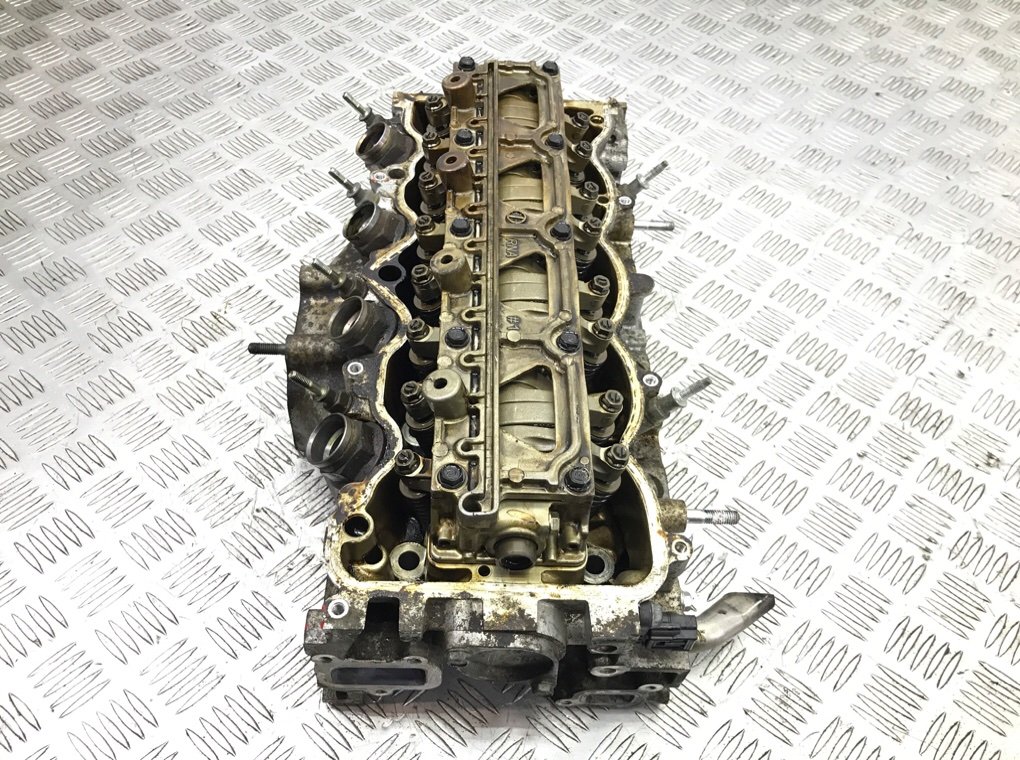 Головка блока цилиндров бу для Honda Civic 8 1.8 i, 2006 г. Головка блока цилиндров бу для Honda Civic 8 1.8 i, 2006 г.