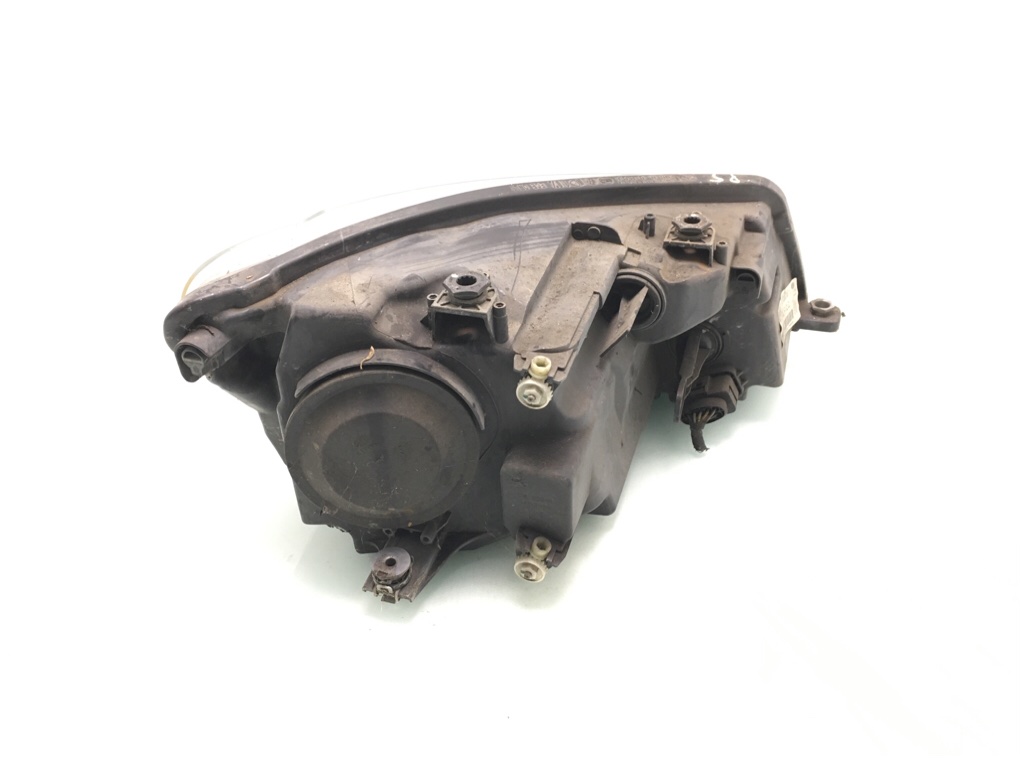 Фара левая бу для Volkswagen Caddy  1.6 TDi,  2012 г.