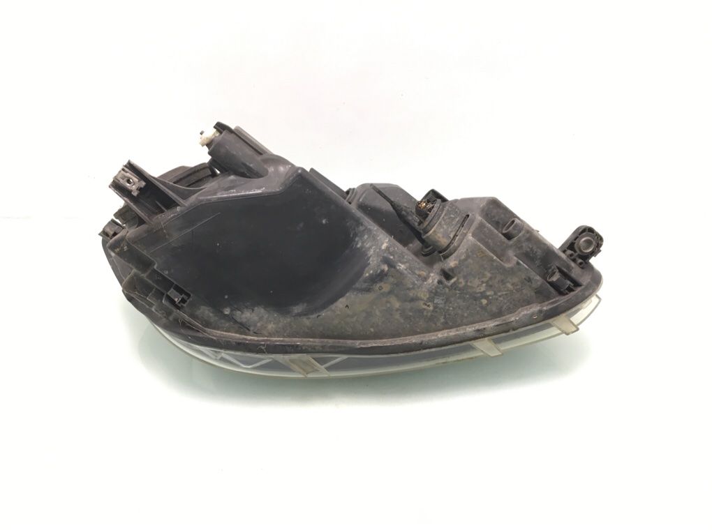 Фара левая бу для Volkswagen Caddy  1.6 TDi,  2012 г.