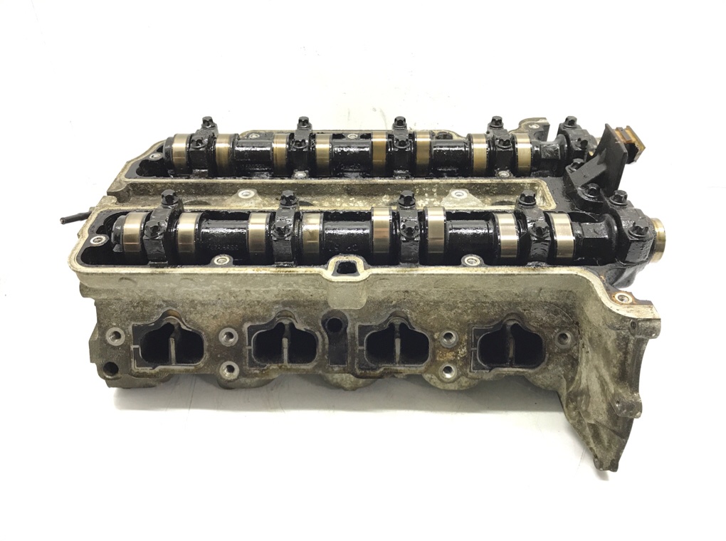 Головка блока цилиндров бу для Opel Corsa D 1.4 i, 2013 г.