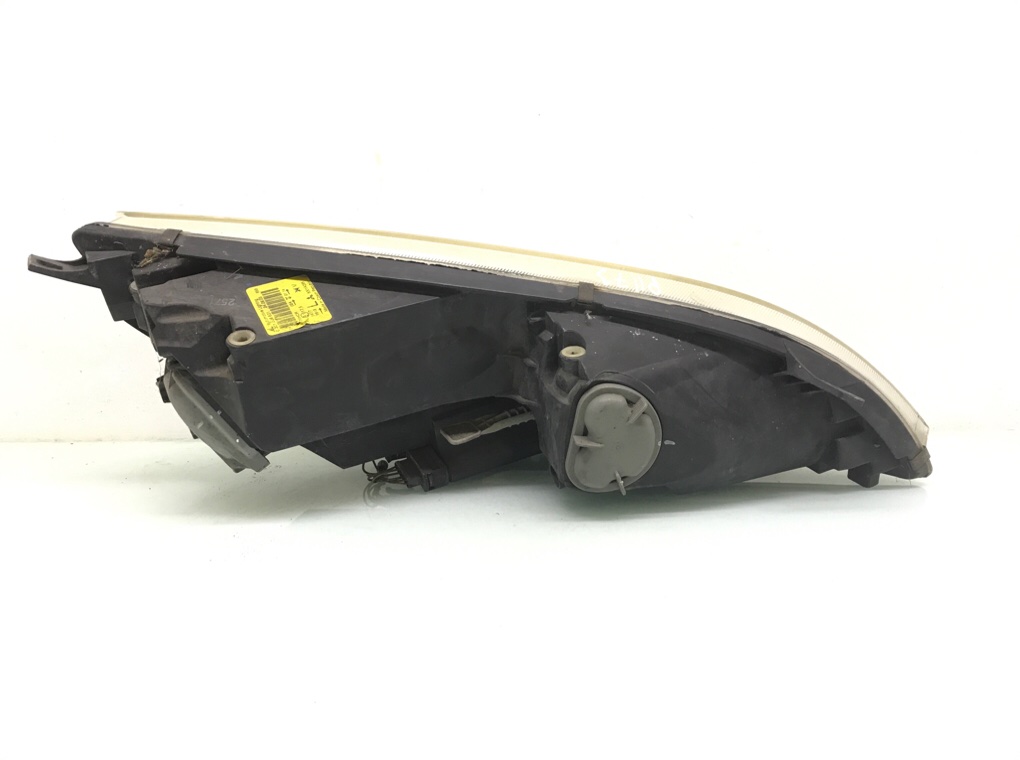 Фара левая бу для Mitsubishi Colt 6 1.1 i,  2006 г.