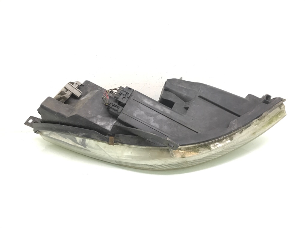 Фара левая бу для Mitsubishi Colt 6 1.1 i,  2006 г.